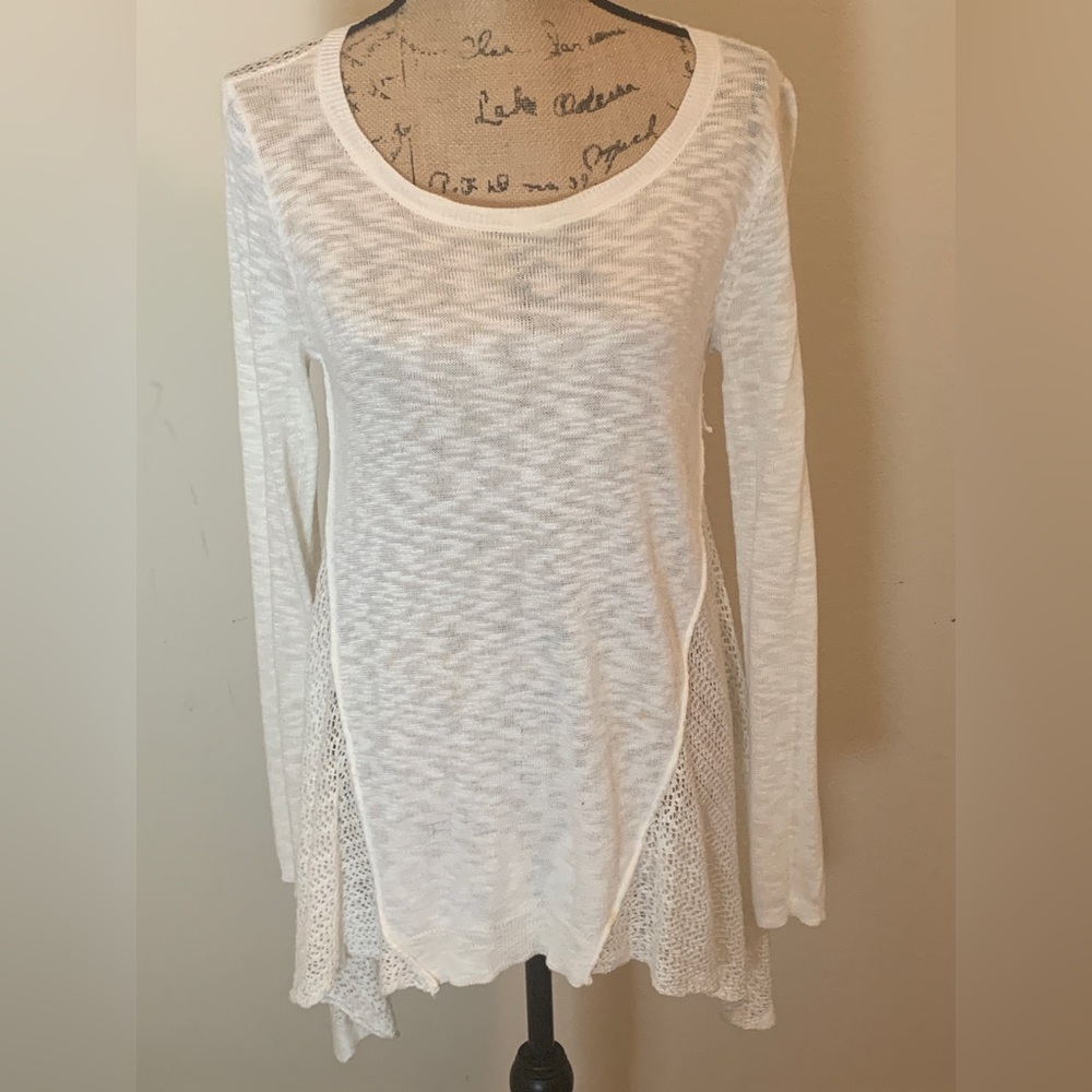 Cream tunic top.